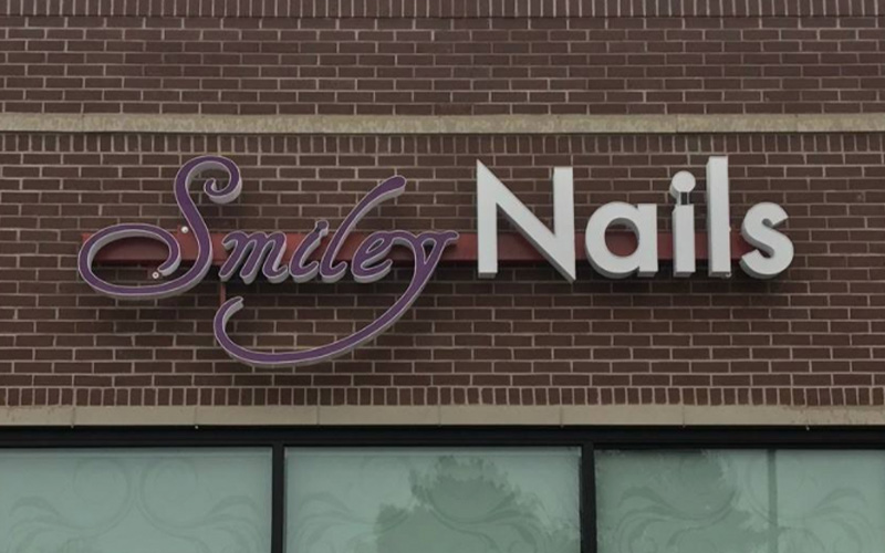 Exterior wall sign for Smiley Nails